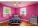 Bedroom with wood floors, pink wall, bed, a ceiling fan, and a single window at 3120 7Th Street Ne Dr, Hickory, NC 28601
