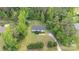 A high angle view of the house highlighting a picturesque yard and mature tree canopy at 321 Woodcrest Dr, York, SC 29745