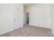 Cozy bedroom featuring plush carpet and an open closet at 321 Woodcrest Dr, York, SC 29745