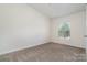 Cozy bedroom featuring plush carpet and a brightly lit window at 321 Woodcrest Dr, York, SC 29745