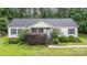 Inviting single-story home with a classic design and a neatly landscaped front yard at 321 Woodcrest Dr, York, SC 29745