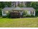 Charming single-story home with a well-maintained lawn and a quaint front porch entry at 321 Woodcrest Dr, York, SC 29745