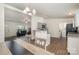 Bright and airy kitchen with granite countertops and modern appliances, connecting to living area at 321 Woodcrest Dr, York, SC 29745