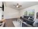 Cozy living room with comfortable seating, a ceiling fan, and lots of windows for natural light at 321 Woodcrest Dr, York, SC 29745