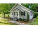 Gray house with black shutters and a short walkway to the front door and front yard at 352 18Th Ne Ave, Hickory, NC 28601
