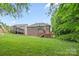 View of the house from the backyard showing the deck and porch at 405 Deer Brush Ln, Waxhaw, NC 28173