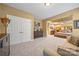 Large bedroom with carpet and access to the main bedroom at 405 Deer Brush Ln, Waxhaw, NC 28173