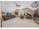 Spacious bonus room provides ample seating and natural light from the many windows at 405 Deer Brush Ln, Waxhaw, NC 28173