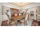Elegant dining room with detailed furnishings and hardwood floors at 405 Deer Brush Ln, Waxhaw, NC 28173