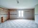 Spacious bedroom with built-in shelving, carpet flooring and a bright window at 4115 Jenkins Rd, Marshville, NC 28103