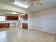 Open concept living area featuring ample counter space, tile flooring and appliances at 4115 Jenkins Rd, Marshville, NC 28103