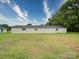 Simple outbuilding with a clean white exterior, offering versatile space on the property at 4115 Jenkins Rd, Marshville, NC 28103