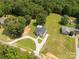 An aerial shot of a house with long circular driveway on acres of green land surrounded by woods at 4285 Palmer Lloyd Rd, Lancaster, SC 29720