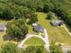 An aerial shot of a charming home situated on expansive green land with a long circular driveway at 4285 Palmer Lloyd Rd, Lancaster, SC 29720