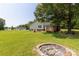 Large backyard with firepit and shed, ideal for relaxing, storage and entertaining at 4285 Palmer Lloyd Rd, Lancaster, SC 29720