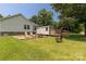 Outdoor space featuring a patio area, shed, picnic table, and fire pit, creating an inviting outdoor gathering spot at 4285 Palmer Lloyd Rd, Lancaster, SC 29720