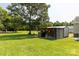 Spacious backyard featuring a shed and large shady tree, perfect for outdoor storage or recreation at 4285 Palmer Lloyd Rd, Lancaster, SC 29720