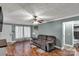Inviting living room with a neutral color scheme, wood-look floors, and comfortable seating, great for Gathering gatherings at 4285 Palmer Lloyd Rd, Lancaster, SC 29720