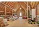 Unfinished attic space with wood floors, exposed rafters, and natural light at 4323 Rosecliff Dr, Charlotte, NC 28277