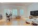 This spacious office has wooden floors, white walls, three windows with plantation shutters, and ample light at 4323 Rosecliff Dr, Charlotte, NC 28277