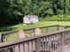 Backyard with a deck, chairs and a lawn shed at 4337 Gelinda Ct, Gastonia, NC 28056