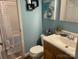 Bathroom features a wood vanity, toilet and tub with shower at 4337 Gelinda Ct, Gastonia, NC 28056