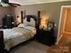 Comfortable main bedroom with a four-poster bed and classic decor at 4337 Gelinda Ct, Gastonia, NC 28056