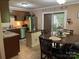 Eat-in kitchen with stainless steel appliances, island and sliding door access to the deck at 4337 Gelinda Ct, Gastonia, NC 28056