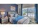 Cozy bedroom featuring natural light, colorful decor, and comfortable furnishings at 4607 Harris Elliot Rd, Lincolnton, NC 28092