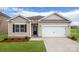 Charming single-story home with manicured lawn, neutral siding, and attached two-car garage at 4607 Harris Elliot Rd, Lincolnton, NC 28092