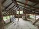 Unfinished attic featuring open rafters, windows, and wooden floors, ready for customization and storage at 528 Waring Ct # Lot 3, Fort Mill, SC 29707