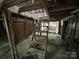 Rustic attic interior featuring exposed wood beams and a staircase, ideal for storage or conversion at 528 Waring Ct # Lot 3, Fort Mill, SC 29707