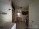 Interior of a bathroom featuring standard fixtures, showing signs of wear and tear and in need of renovation at 528 Waring Ct # Lot 3, Fort Mill, SC 29707