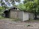 Rustic home showcasing a log cabin exterior with an attached shed, requiring renovation and repairs at 528 Waring Ct # Lot 3, Fort Mill, SC 29707