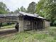 Exterior view of the rustic property with a toy car on the roof and a covered carport at 528 Waring Ct # Lot 3, Fort Mill, SC 29707