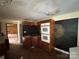 Dated kitchen with wood cabinets, double oven, and unique stone backsplash feature at 528 Waring Ct # Lot 3, Fort Mill, SC 29707
