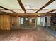 Living room with wood-paneled walls and beamed ceilings, showcasing the home's rustic charm at 528 Waring Ct # Lot 3, Fort Mill, SC 29707