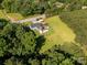 An aerial view of the house and property showing the surrounding green space at 5323 Flat Creek Rd, Heath Springs, SC 29058