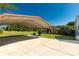 View of the spacious carport featuring a concrete slab and metal covering, perfect for parking at 5323 Flat Creek Rd, Heath Springs, SC 29058