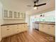 Modern kitchen with white cabinets and stainless steel appliances at 5323 Flat Creek Rd, Heath Springs, SC 29058