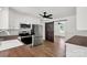 Bright kitchen featuring stainless steel appliances, tile backsplash, and wood counters at 5323 Flat Creek Rd, Heath Springs, SC 29058