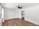 Spacious living room with recessed panel walls, wood floors and an open floor plan at 5323 Flat Creek Rd, Heath Springs, SC 29058