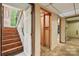 Unfinished basement with staircase leading to the main level at 5626 Sandhurst Rd, Hickory, NC 28602