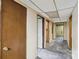 Unfinished basement featuring a hallway and doorway at 5626 Sandhurst Rd, Hickory, NC 28602