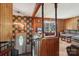 The entryway of the wood-paneled home leads to an open living area at 5626 Sandhurst Rd, Hickory, NC 28602
