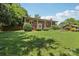 Charming brick home with red shutters and well-manicured lawn and shrubbery at 5626 Sandhurst Rd, Hickory, NC 28602