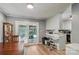 Bright kitchen featuring a sliding glass door with access to a patio and backyard at 5626 Sandhurst Rd, Hickory, NC 28602