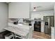 Bright and airy kitchen with breakfast bar featuring modern appliances and countertops at 5626 Sandhurst Rd, Hickory, NC 28602