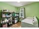 Bright laundry room with shelving units and updated washer and dryer at 5626 Sandhurst Rd, Hickory, NC 28602