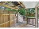 Covered patio with wooden deck leading to a backyard at 5626 Sandhurst Rd, Hickory, NC 28602